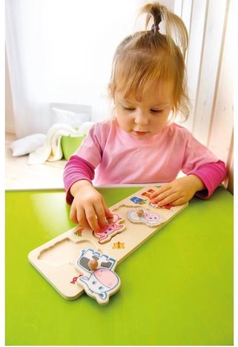 puzzel met knoppen jongen op de boerderij