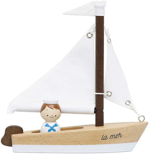 voilier en bois et capitaine